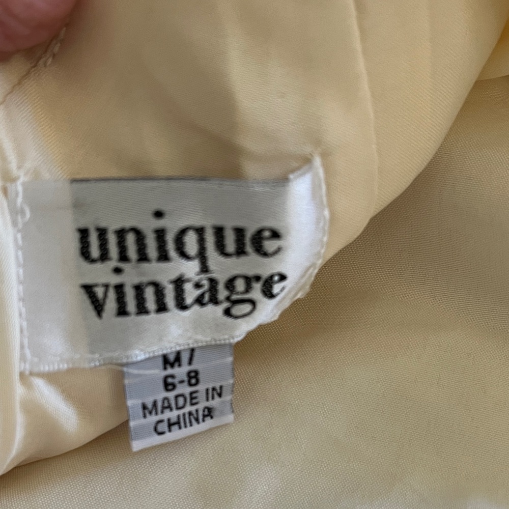 Unique Vintage Ivory Bow Detail Dress - Picture 2 of 9